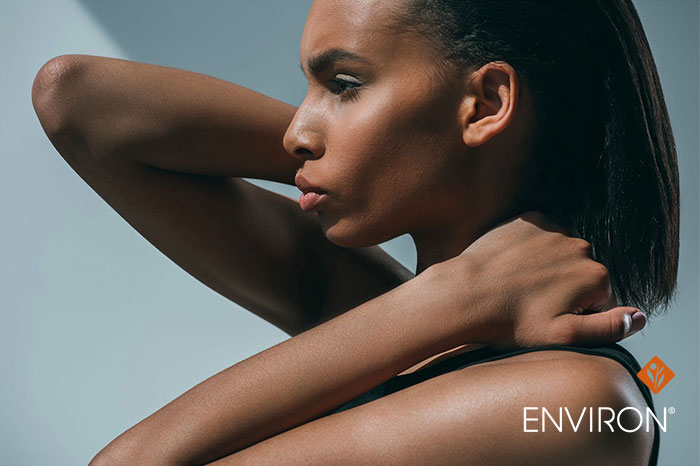 image of women holding her neck and posing